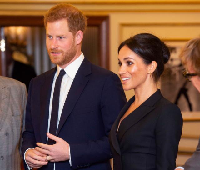 Meghan Markle breaks protocol in tuxedo mini dress